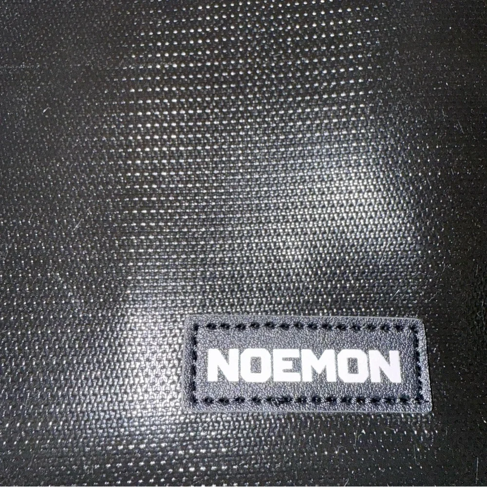 Noemon Black Briefcase Bag – New, 25 Pockets, Never Used